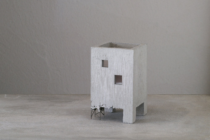 Miniature building shaped flower pots by Pull + Push