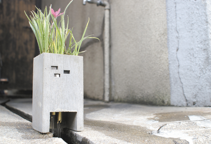 Miniature building shaped flower pots by Pull + Push